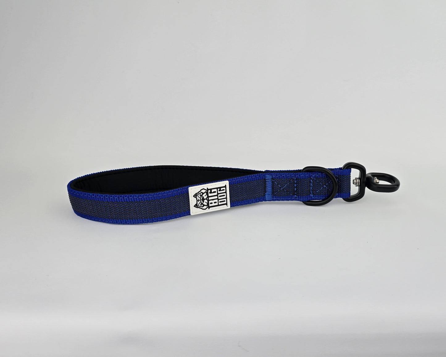 Blue and black dog handle with a The Big Dog Company logo. Neoprene, rubber, nylon. Heavy duty, high quality. 