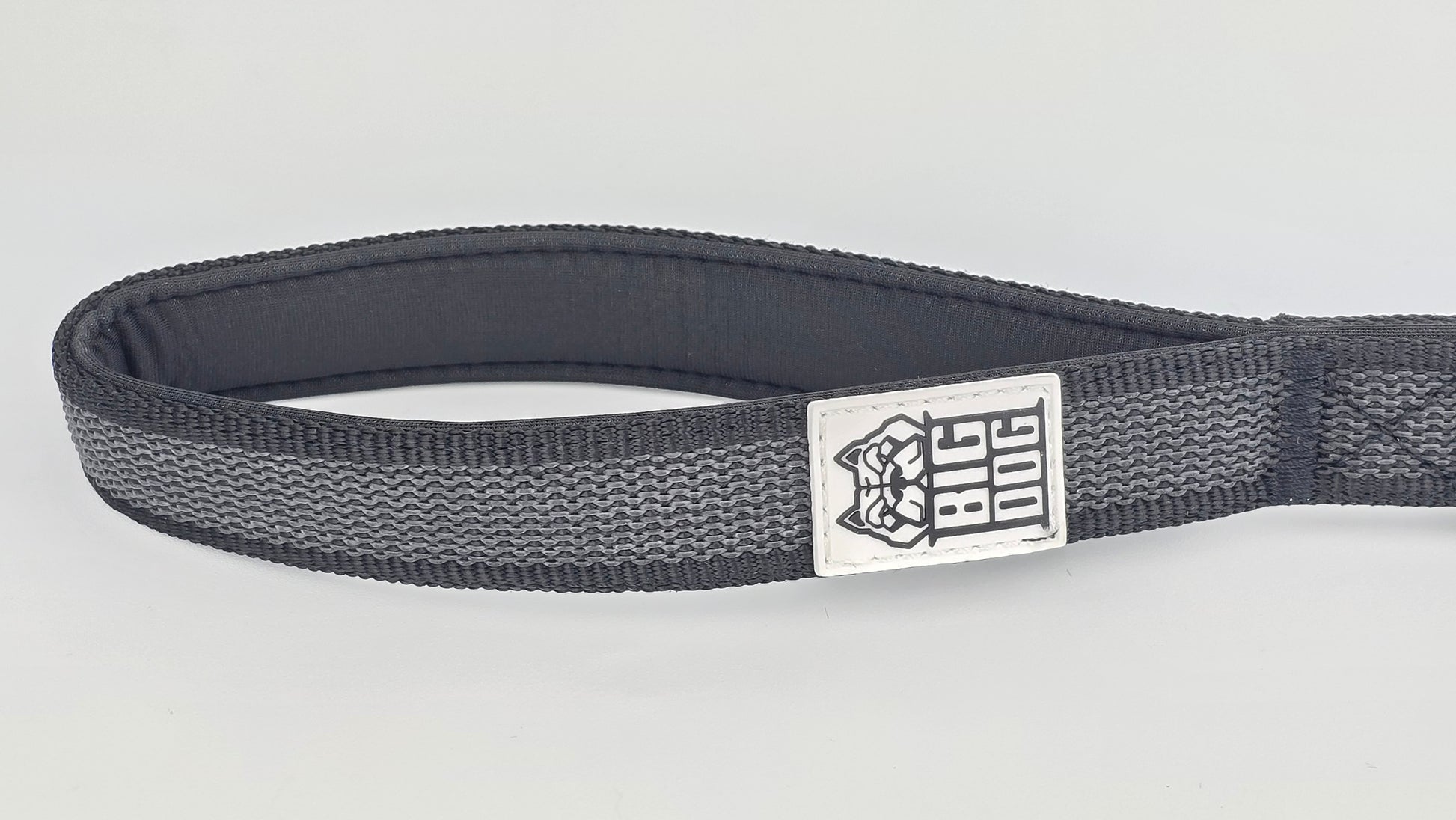 Black on black dog traffic handle with The Big Dog Company logo on a white background. Heavy duty. Nylon, rubber, neoprene.