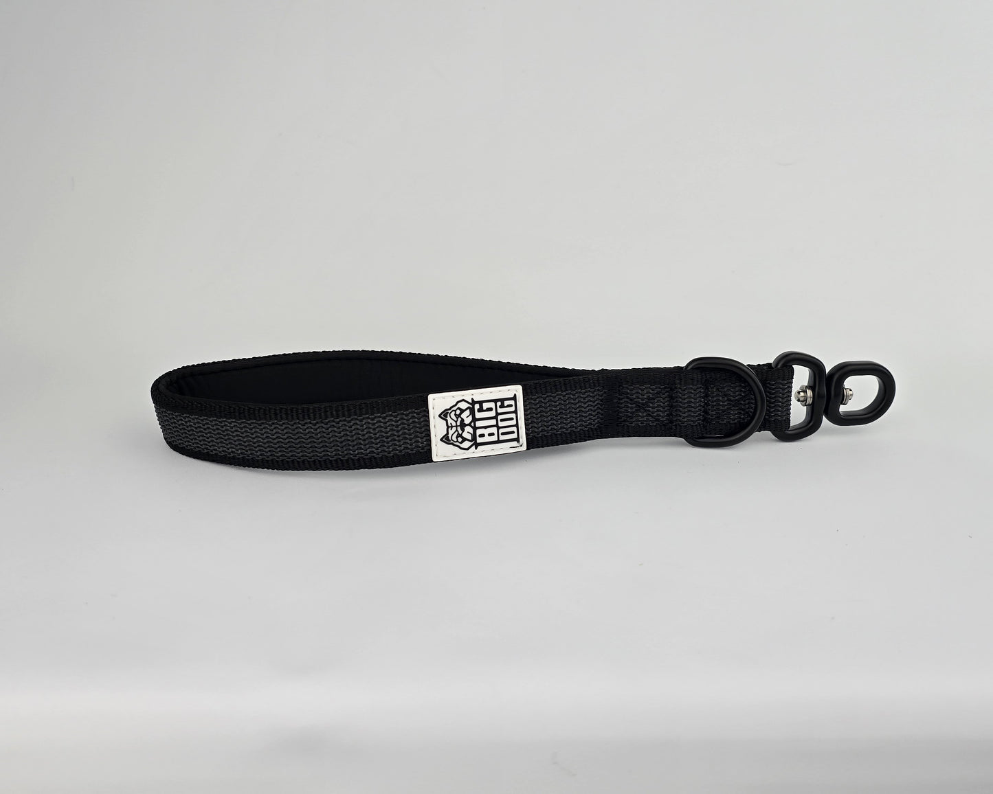 Black on black dog traffic handle with The Big Dog Company logo on a white background. Heavy duty. Nylon, rubber, neoprene.