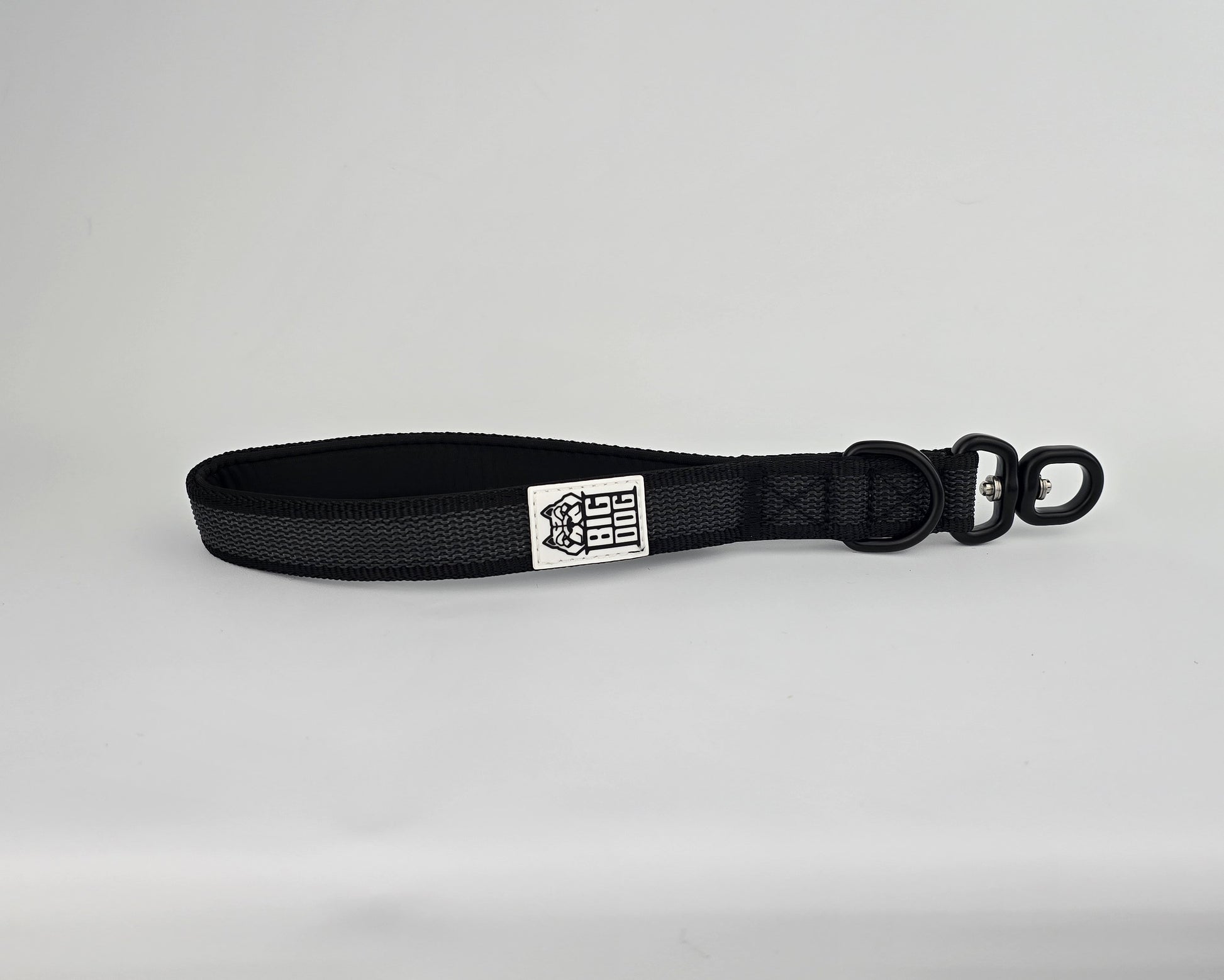 Black on black dog traffic handle with The Big Dog Company logo on a white background. Heavy duty. Nylon, rubber, neoprene.