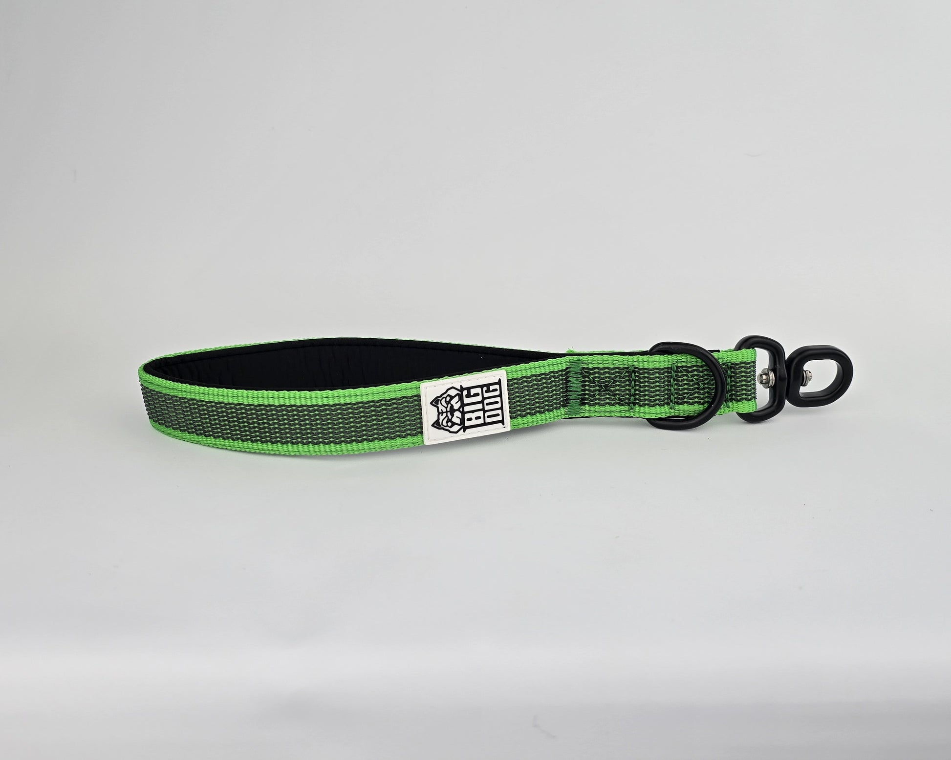 Green and black dog traffic handle with The Big Dog Company logo on a white background. Heavy duty. Nylon, rubber, neoprene.