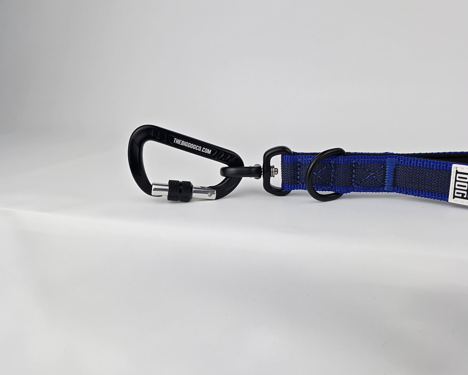 Blue and black dog handle with a The Big Dog Company logo. Neoprene, rubber, nylon. Heavy duty, high quality. 