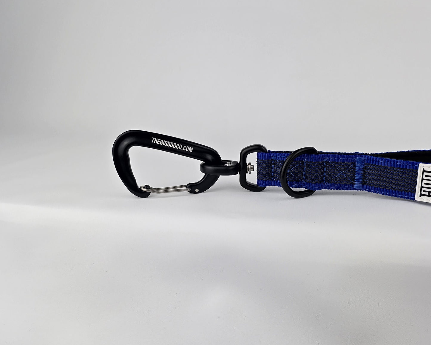 Blue and black dog handle with a The Big Dog Company logo. Neoprene, rubber, nylon. Heavy duty, high quality. 