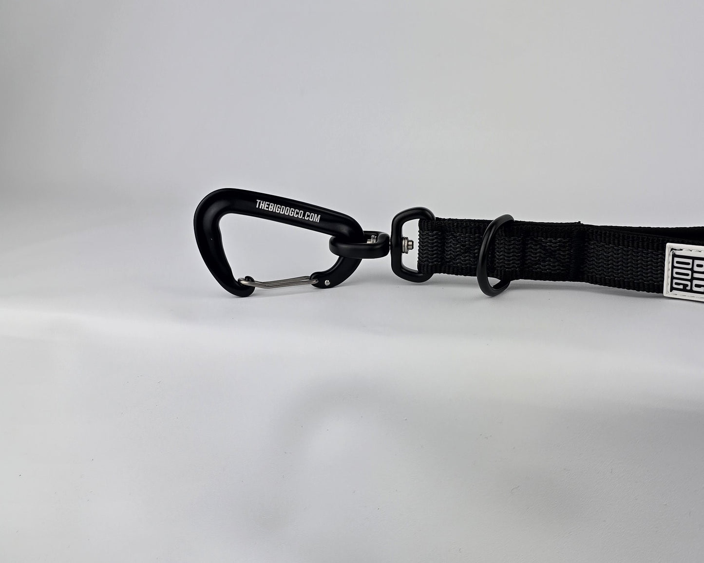 Black on black dog traffic handle with The Big Dog Company logo on a white background. Heavy duty. Nylon, rubber, neoprene.