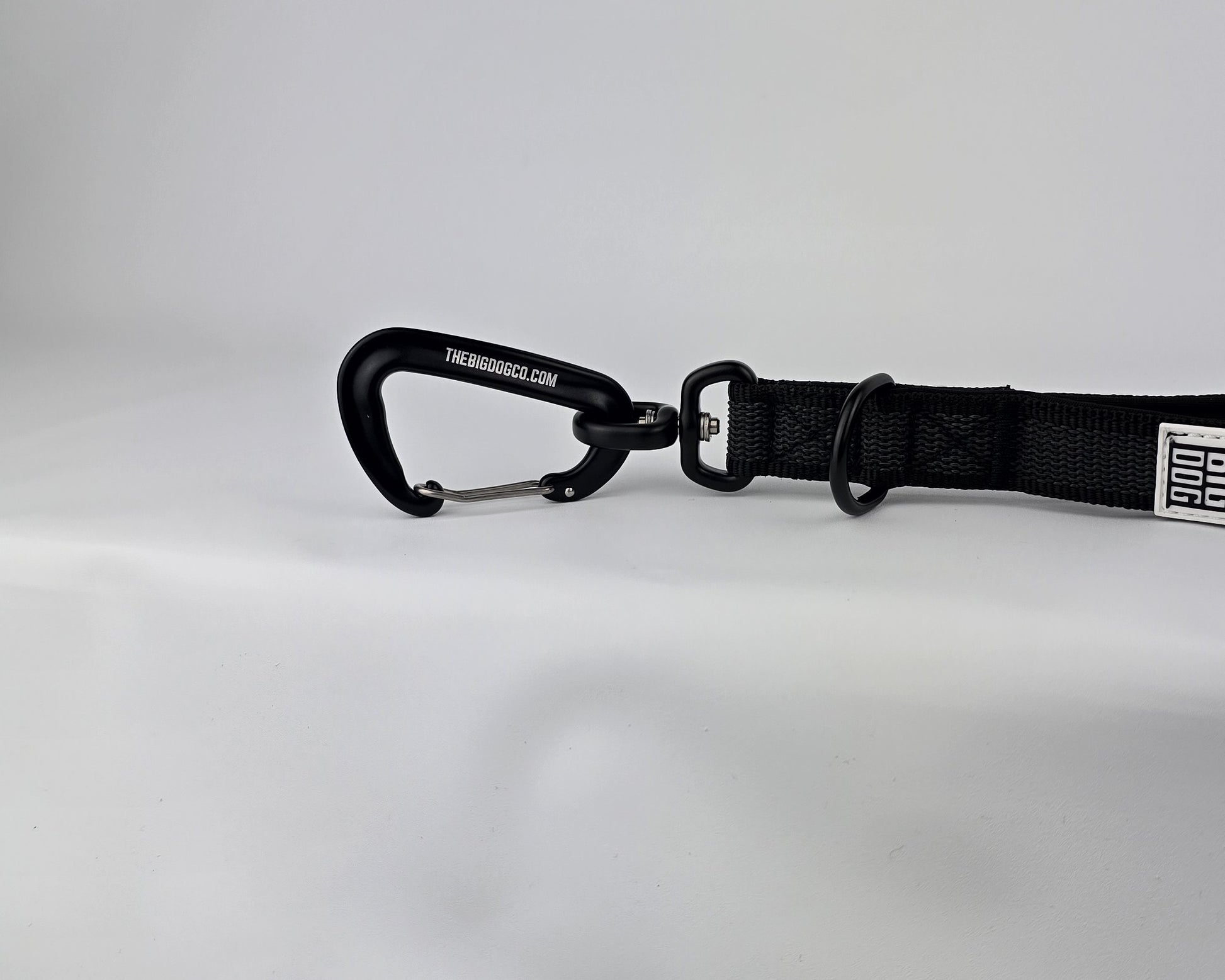 Black on black dog traffic handle with The Big Dog Company logo on a white background. Heavy duty. Nylon, rubber, neoprene.