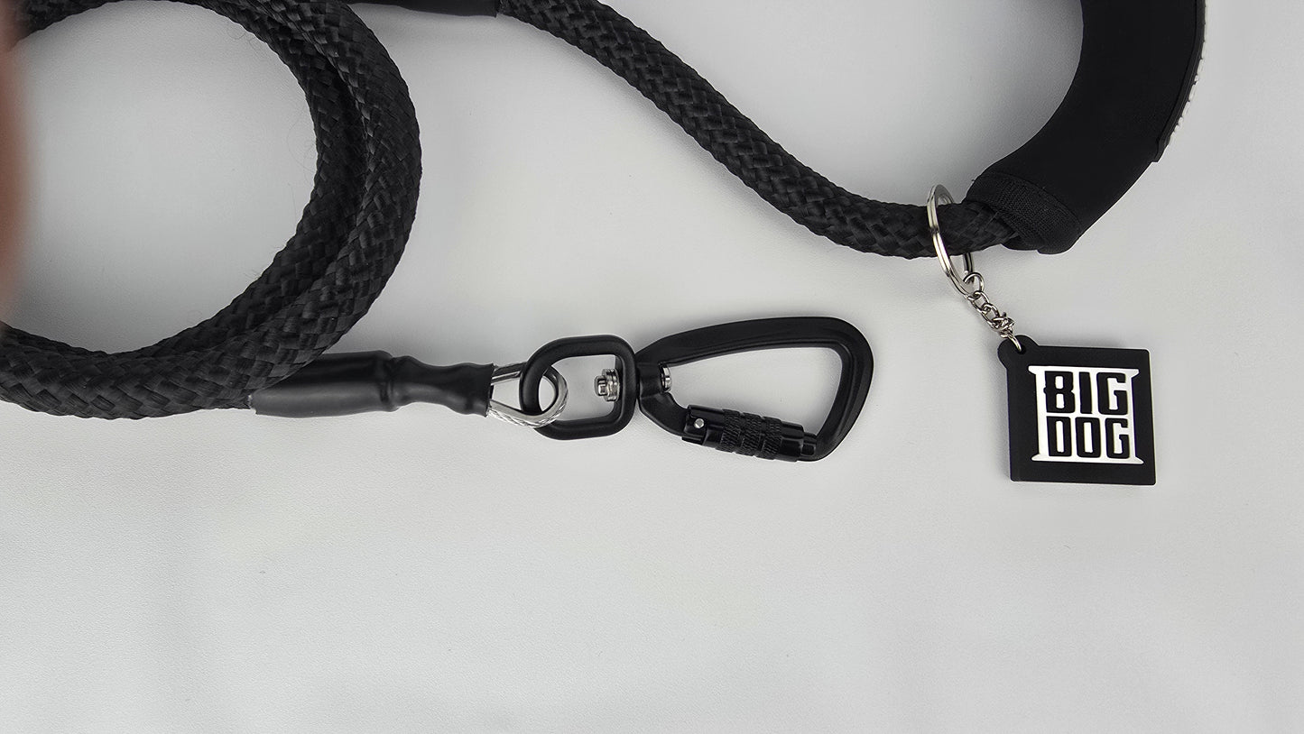 Black heavy duty climbing rope dog leash with swivel carabiner and neoprene handle. Internal steel cable, anti chew.